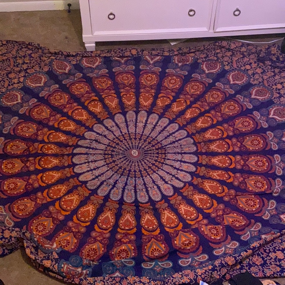 A big spiral tapestry.